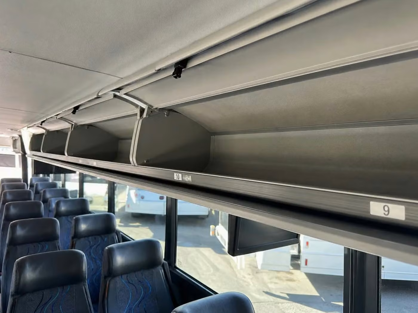 cooper city 25 passenger minibus overhead storage