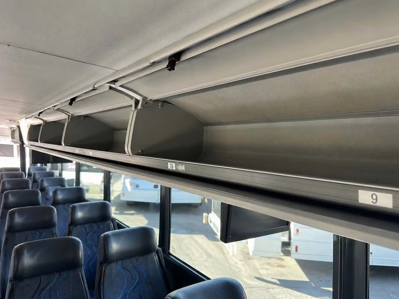 cooper city 35 passenger minibus overhead storage