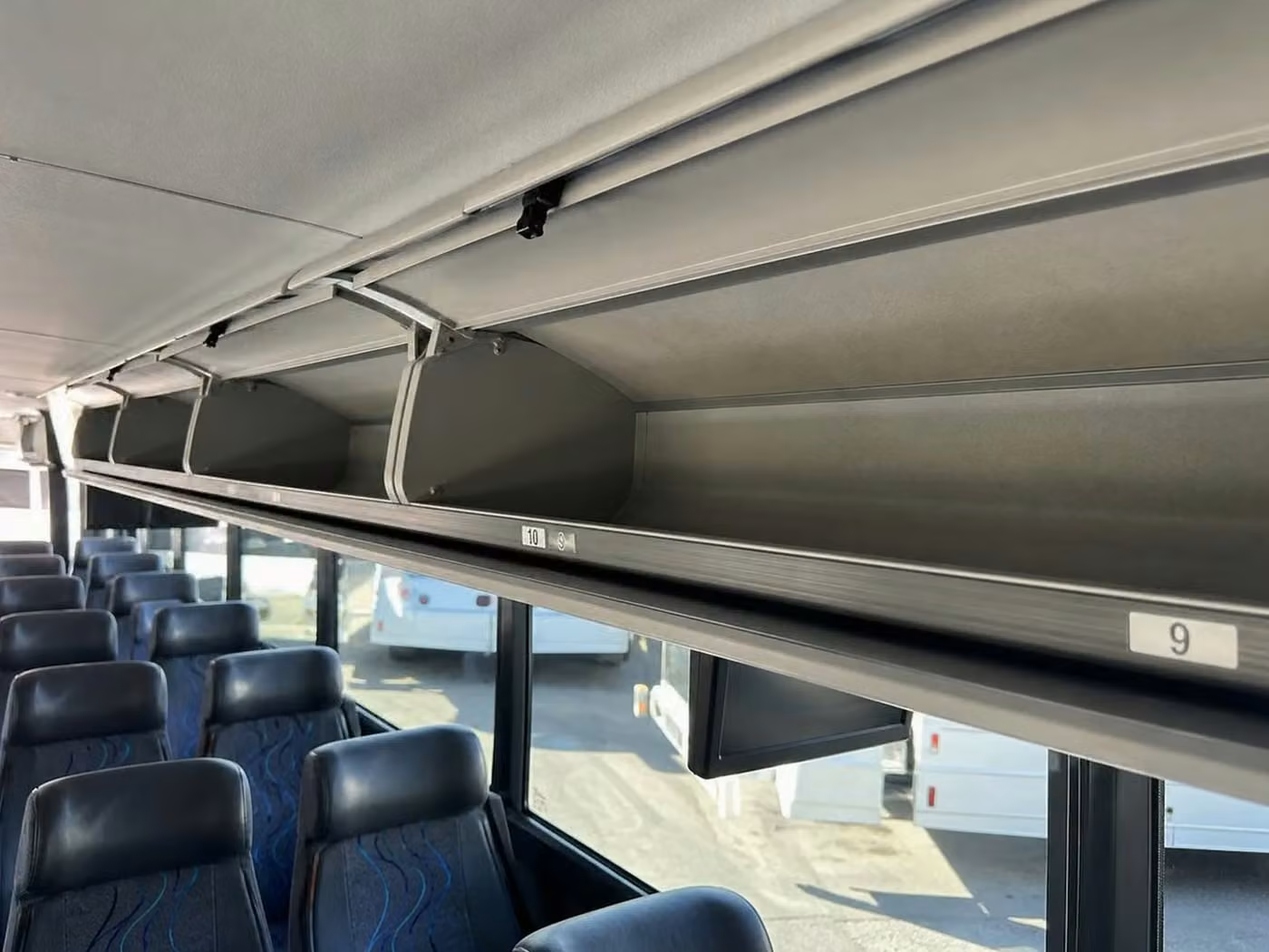 cooper city charter bus overhead storage
